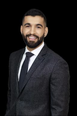 Nick Atwal in a suit
